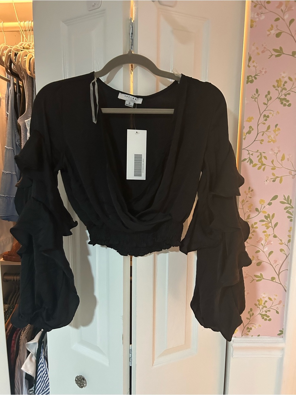 Black crop long sleeve V neck top, with ruffled sleeves